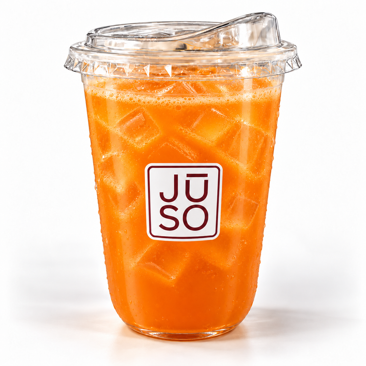 JŪSO Carrot Pure Press served over ice in a branded clear cup with a matching sip lid