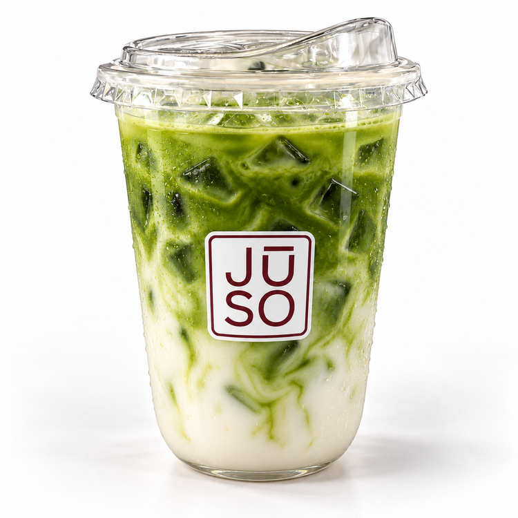 JŪSO OG Matcha Latte served iced with green matcha and milk in a branded clear cup