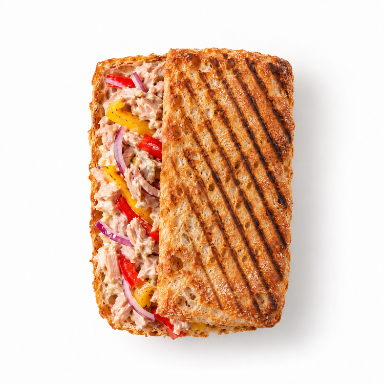 Tuna Crunch Melt with tuna mayo, peppers and red onion in grilled sourdough ciabatta