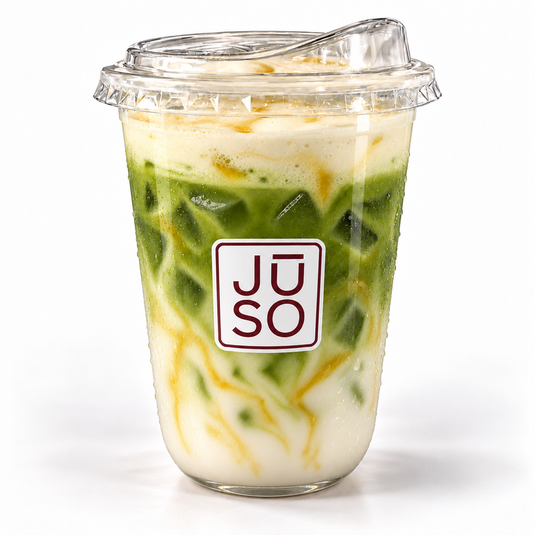 JŪSO Whipped Honey Matcha served iced with milk, honey and pale cold foam in a branded clear cup